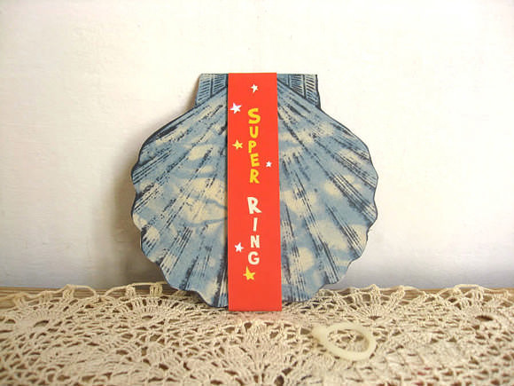 Handmade seashell Valentine with a cold porcelain ring tucked inside, via Misako Mimoko on Etsy