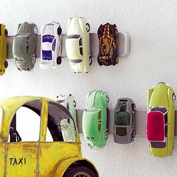 IKEA Hacks for Kids' Rooms: GRUNDTAL magnetic knife rack repurposed as a wall storage for toy cars