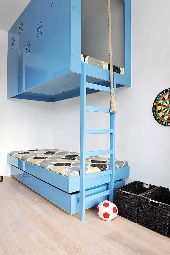 sleek + modern blue bunk beds in a kid's room