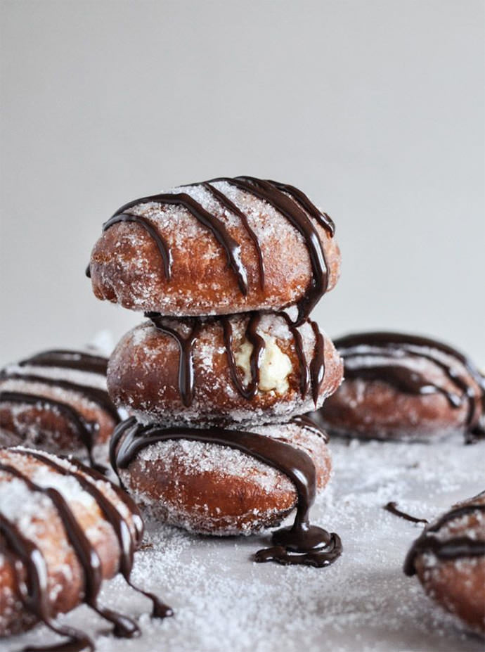 Peanut Butter Cream Filled Donuts Recipe via How Sweet It Is